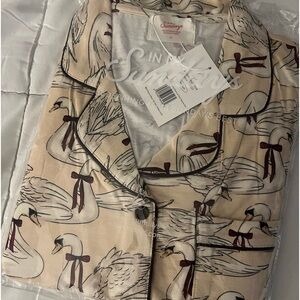 IN MY SUNDAYS SWAN PJs
BRAND NEW!!
Size medium
Still in the bag!!